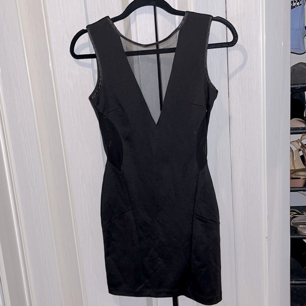 Black slick dress with v style back